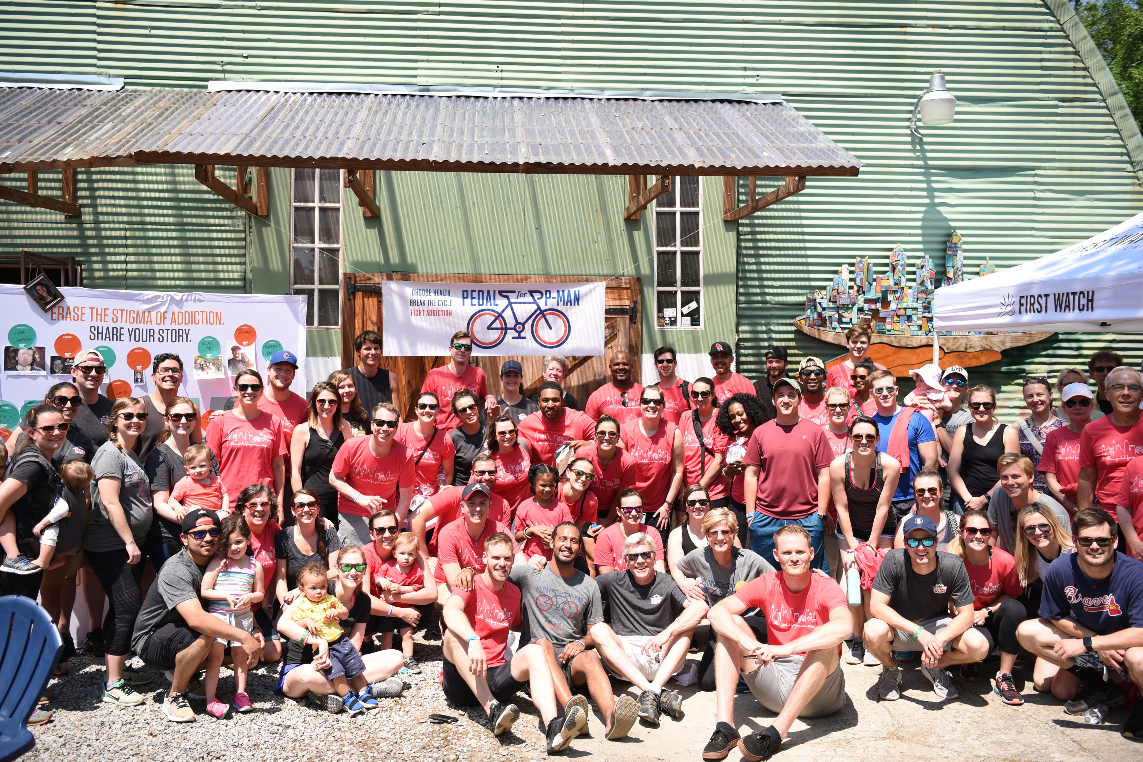 P-Man Foundation community gathering with large group