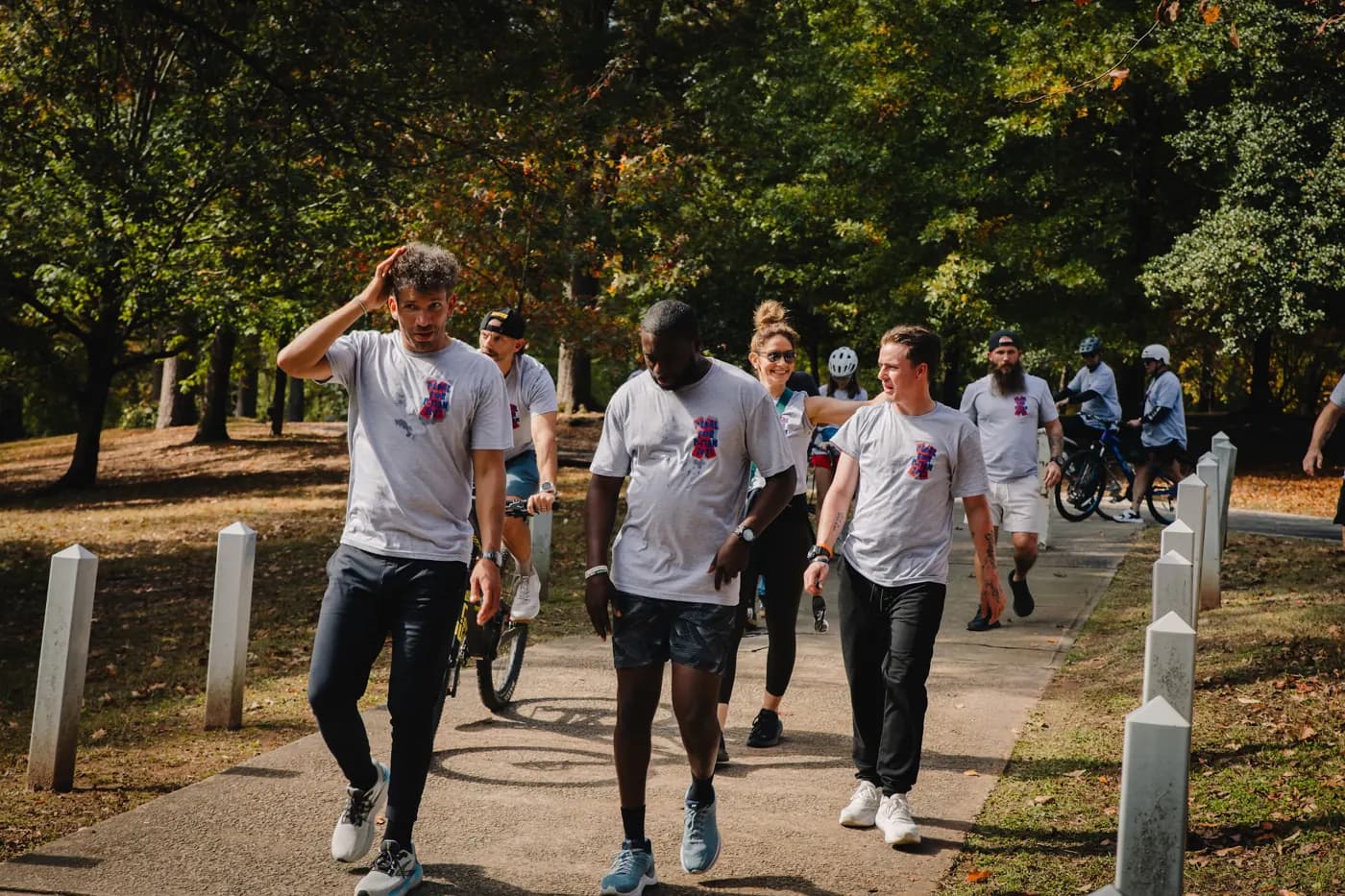 Participants walk together along the park path at the 2025 event.